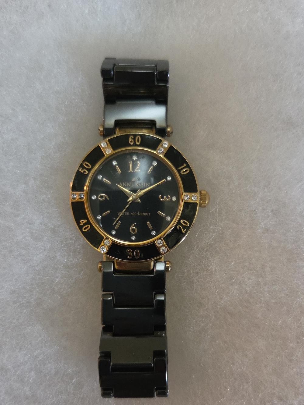 Anne Klein Black and Gold Women's Ceramic Link Watch with Crystal Accents